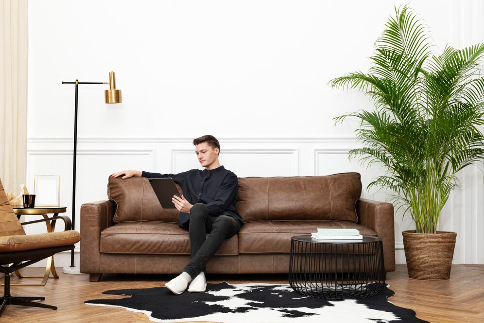 man-using-tablet-working-from-home_53876-132354